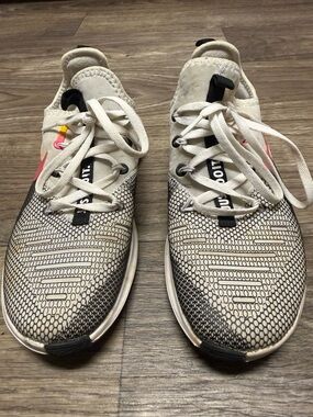 Women’s Nike White and Black Patterned Athletic Sneakers